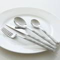 16 Piece White Faux Marble Cutlery Set