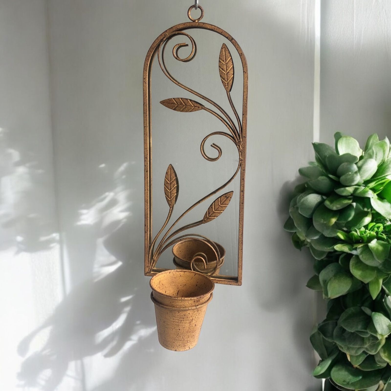 56cm Rusty Wall Mirror with Planter