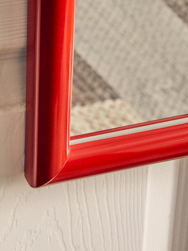 Red Plastic Frame Over Door Mirror