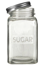Set of Three Glass Jars With Silver Lids
