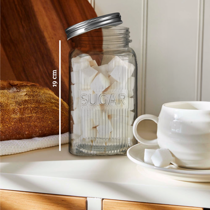 Set of Three Glass Jars With Silver Lids