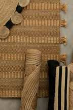 Small Sand and Black Braided Rug