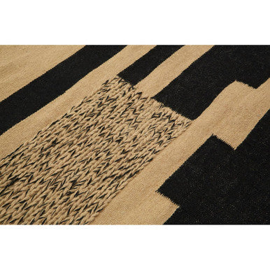 Small Sand and Black Braided Rug