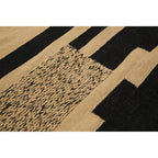 Small Sand and Black Braided Rug