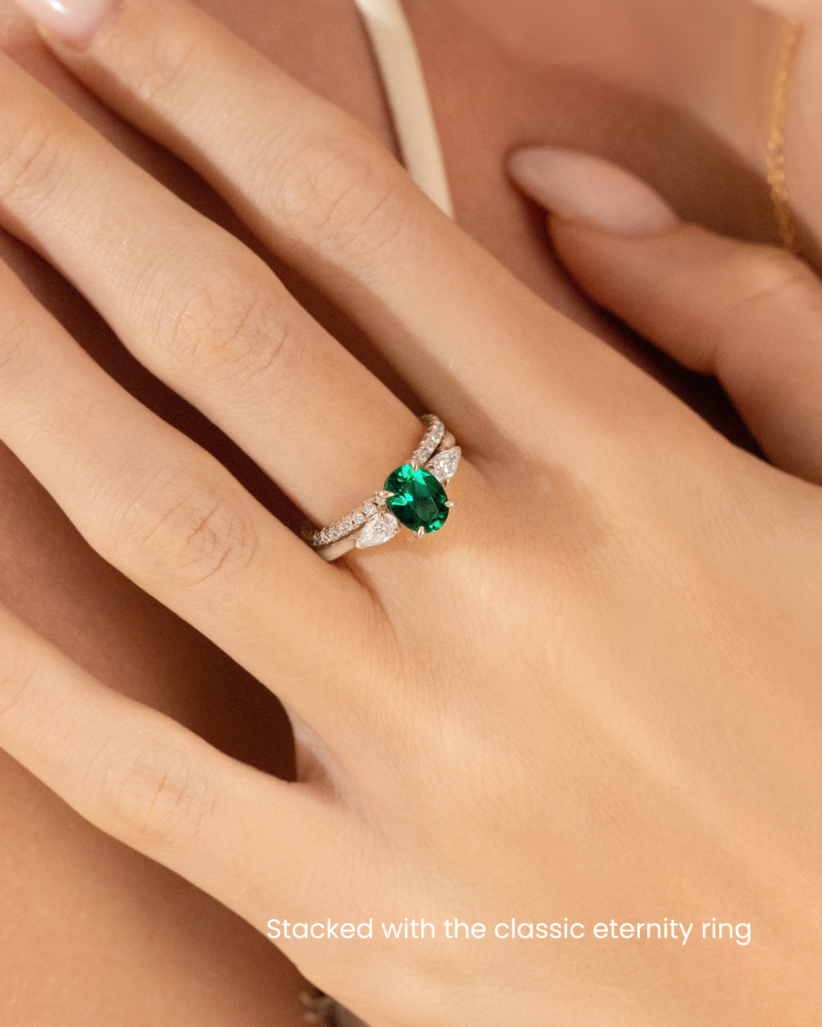 Emerald Oval Cut Three Stone Engagement Ring in Sterling Silver
