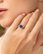 Blue Sapphire Round Cut Three Stone Engagement Ring in Sterling Silver