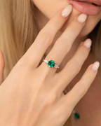 Emerald Round Cut Three Stone Engagement Ring in Sterling Silver