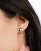 Blue Topaz Oval Stud Earrings in Sterling Silver