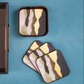 Set of 4 Gold and White Bullseye Coasters