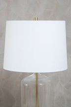 White Fabric Shade Table Lamp with Brass and Clear Glass Base