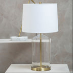 White Fabric Shade Table Lamp with Brass and Clear Glass Base