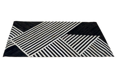 Small Black and White Hair on Leather Rug
