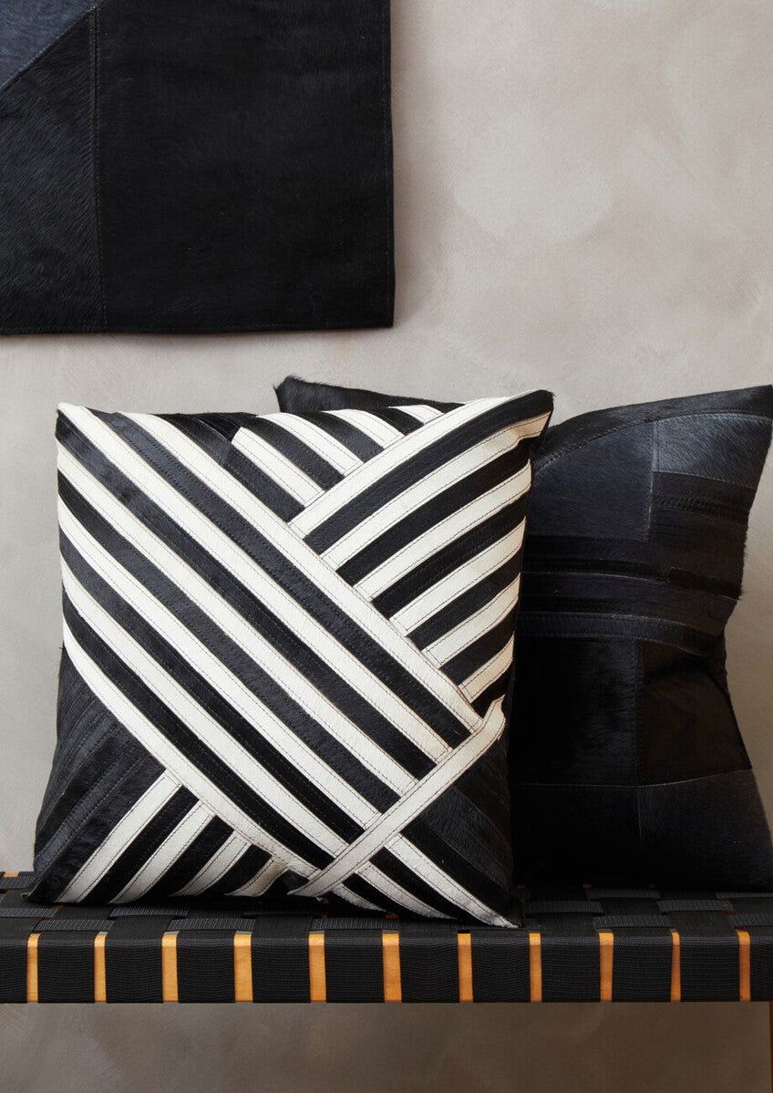 Black and White Hair on Leather Cushion