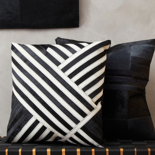 Black and White Hair on Leather Cushion