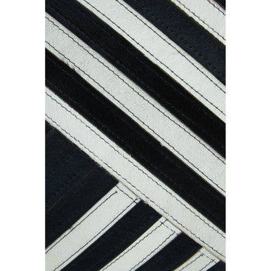 Black and White Hair on Leather Cushion