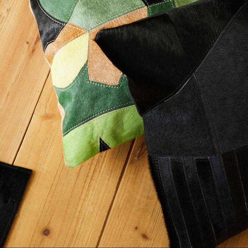 Black And Grey Hair on Leather Cushion