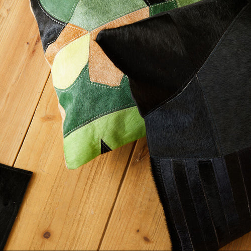 Black And Grey Hair on Leather Cushion