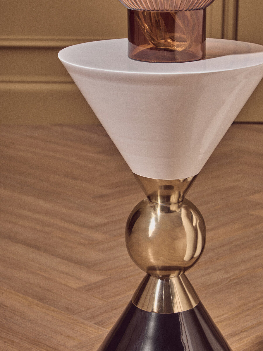Gold and Black Metal Angular Side Table with White and Black Top and Rounded Base