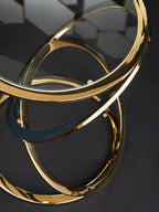 Gold Finish Rings Shaped Base End Table with Clear Glass Top
