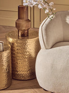 Set of 2 Gold Metallic Cylindrical Side Tables and Stools with Chevron Textured Surface