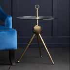 Clear Glass Top Side Table with Gold Tripod Metal Frame and Globe Detail