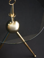 Clear Glass Top Side Table with Gold Tripod Metal Frame and Globe Detail