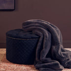 Round Black Velvet Ottoman with Button Tufting