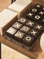 Black and White Noughts and Crosses
