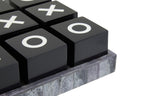 Black and White Noughts and Crosses
