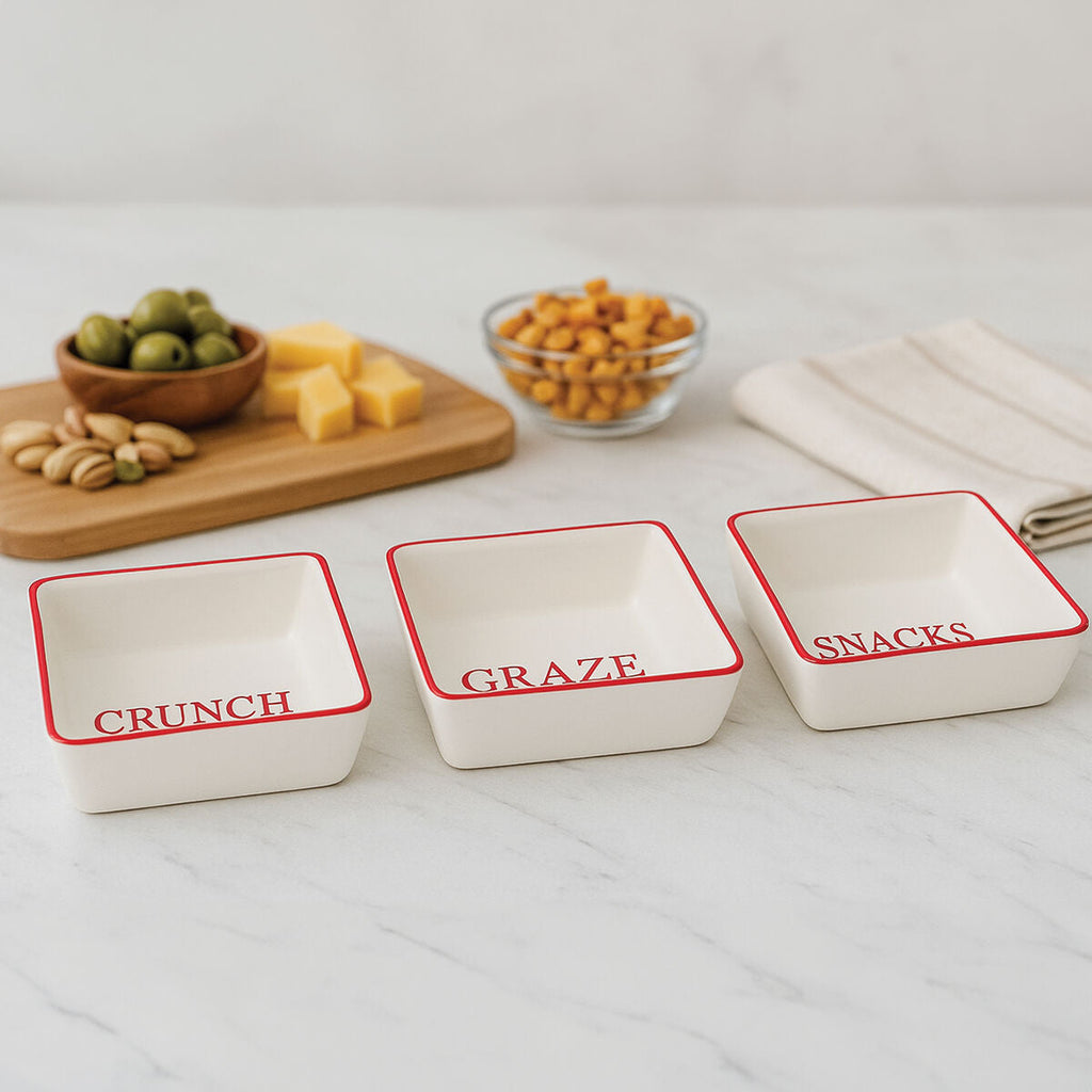 Set of Three Cream Stoneware Snack Dishes with Red Trim