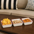 Set of Three Cream Stoneware Snack Dishes with Red Trim