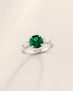 Emerald Round Cut Three Stone Engagement Ring in Sterling Silver
