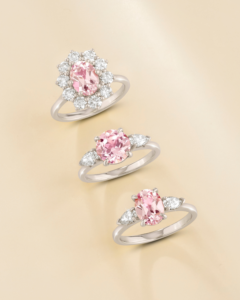 Pink Sapphire Oval Cut Three Stone Engagement Ring in Sterling Silver