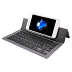 F18 Ultra-slim Rechargeable Foldable 58 Keys Bluetooth Wireless Keyboard with Holder – Bluetooth Grey