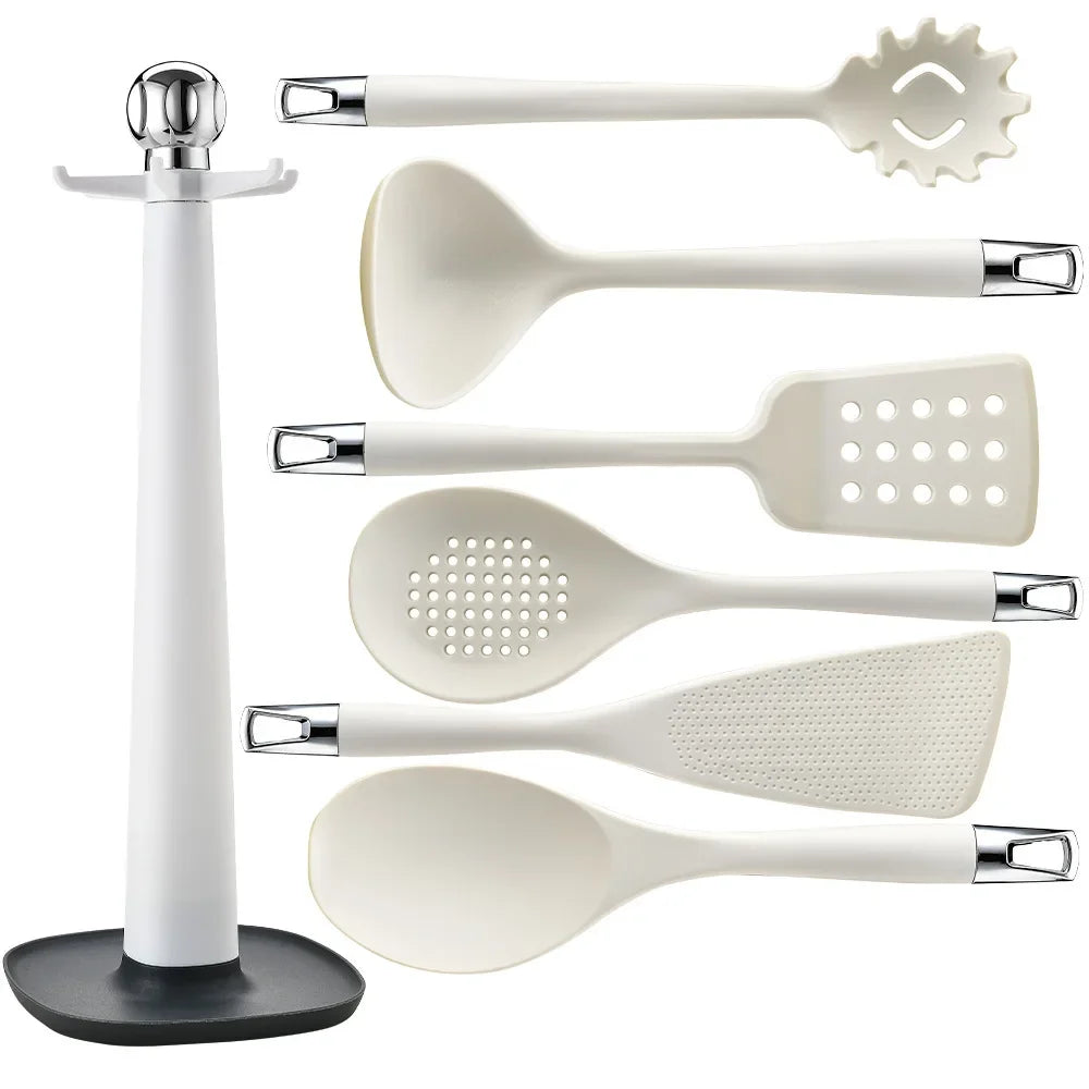 7-Piece Silicone Kitchen Utensils Set with 360° Rotating Countertop Holder – White silicone heads and handles with silver-tone stainless steel hanging hooks/end caps. Heat-Resistant, Dishwasher Safe