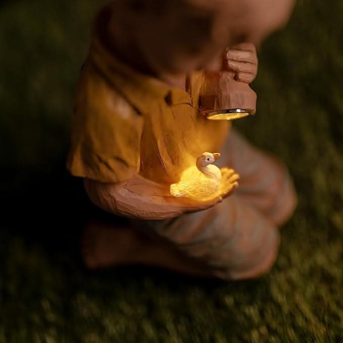 Solar Boy and Duck Garden Ornament with LED Flashlight 25cm