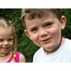 Child Truth Polished Cognac Baltic Amber Sodalite Necklace