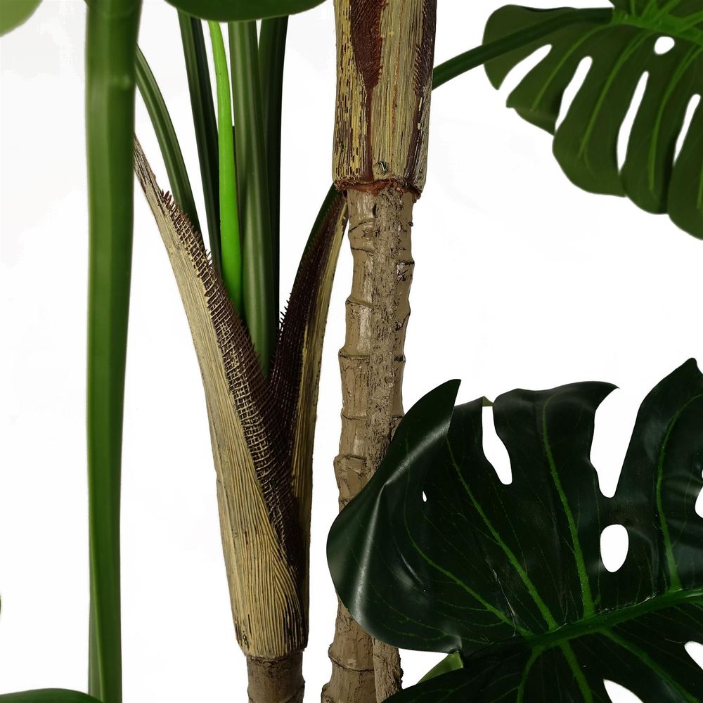 Luxury 150cm (5ft) Monstera Cheese Plant - Realistic, " Description: "Experience the luxury of a realistic, 150cm Monstera Cheese Plant. Comes potted in a sleek black pot. addition to any space