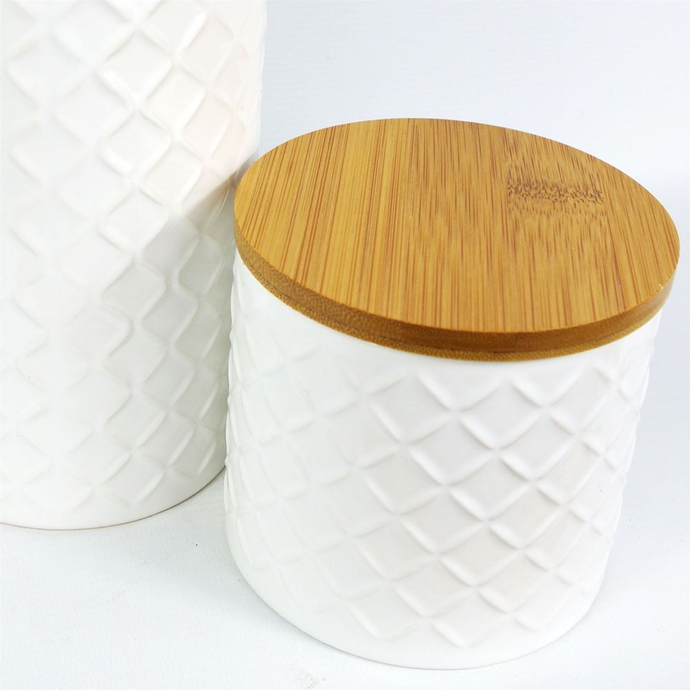 Set of Two Ceramic Jars Embossed Cream Canisters with Lids in Ceramic