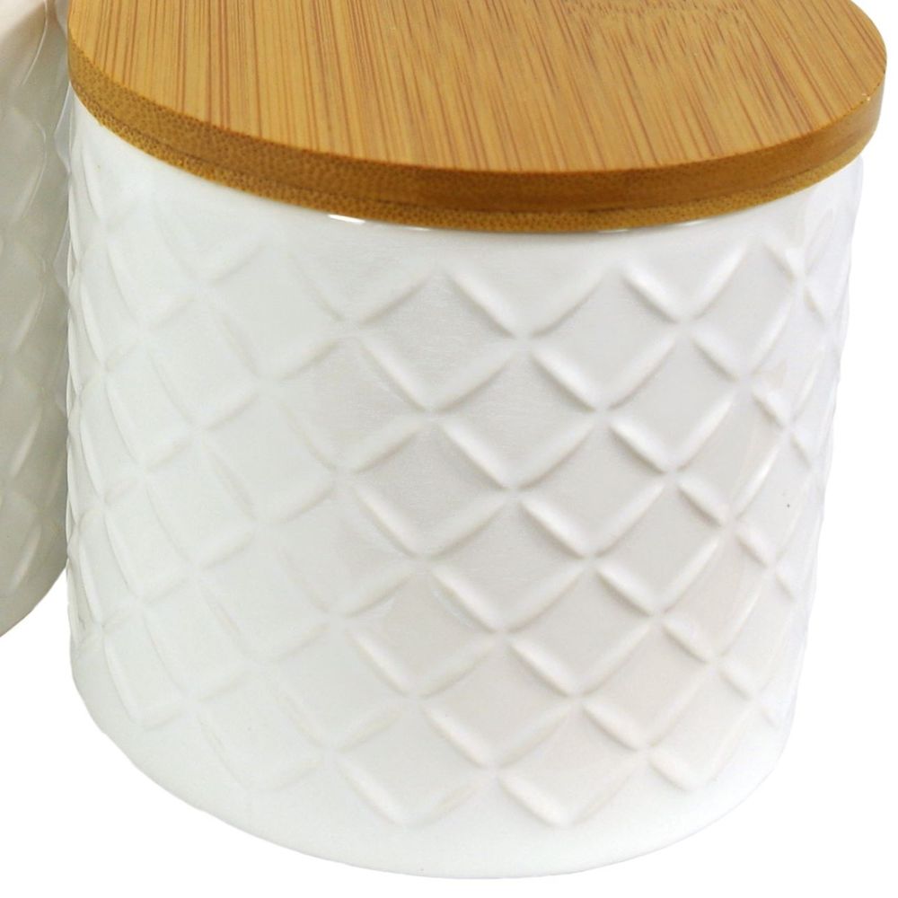 Set of Two Ceramic Jars Embossed Cream Canisters with Lids in Ceramic